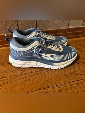 Reebok Woman’s Blue and White Athletic Running Shoes